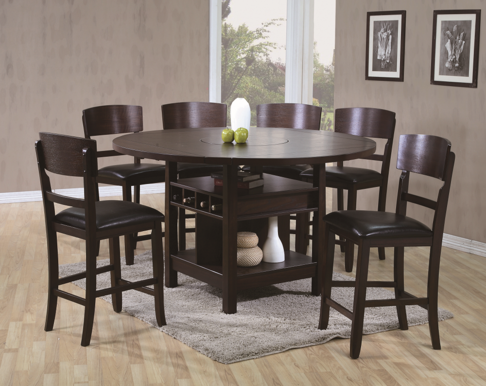 Brown wooden round dining room table and chairs by American Freight