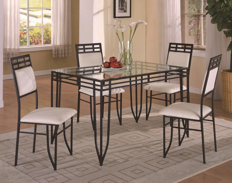 Glass and metal 4 chair dining set by American Freight